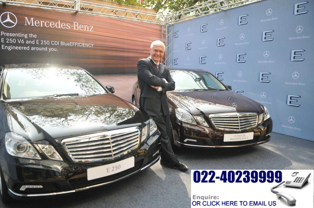 Mercedes E250cdi & e250V6 pictures Blueefficiency India  Mercedes mumbai Wilfried G. Aulbur, Managing Director and Chief Executive Officer of Mercedes Benz India, poses in support of a picture in the launch of the company's new to the job E-Class car